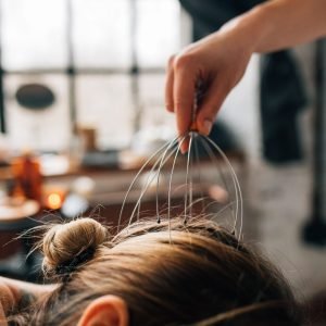 Home A soothing head massage session indoors, promoting relaxation and self-care.